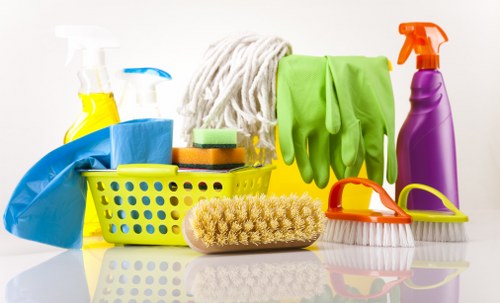 Team performing deep cleaning in a modern office